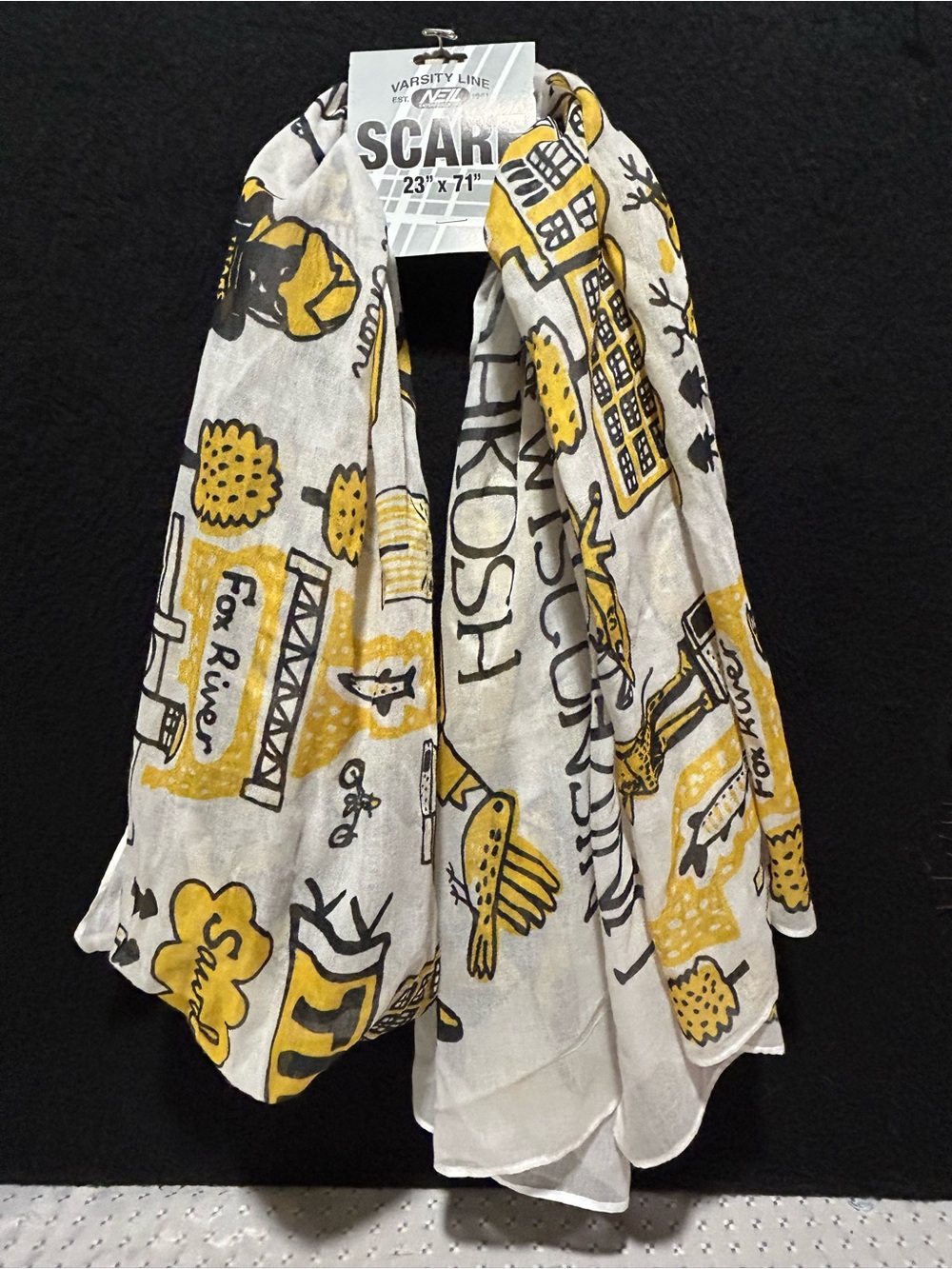 Scarf by artist Julia Gash featuring landmarks related to Oshkosh, Wisconsin
